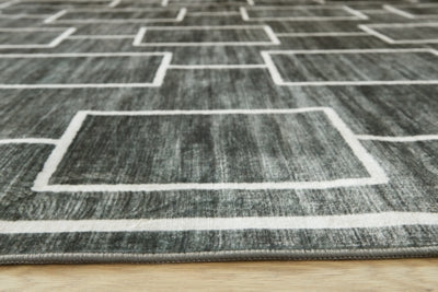 Elderland Washable 7'6" x 9'6" Area Rug - Orlando Furniture Outlet (Casselberry,FL)
