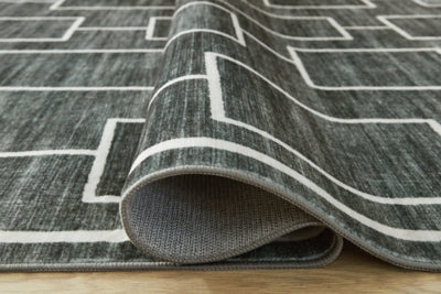 Elderland Washable 7'6" x 9'6" Area Rug - Orlando Furniture Outlet (Casselberry,FL)